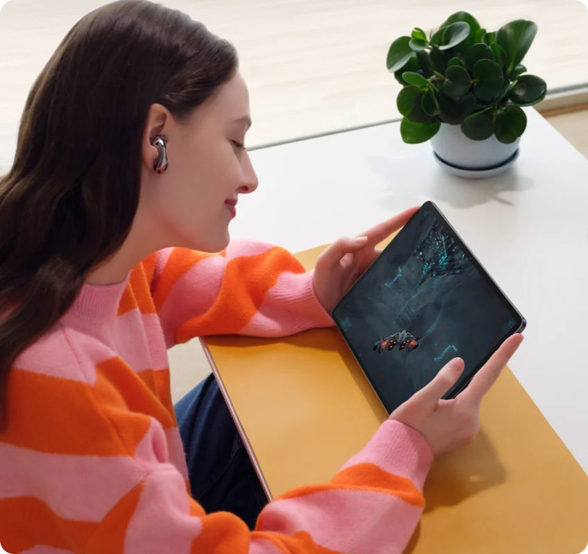 A woman using the tablet