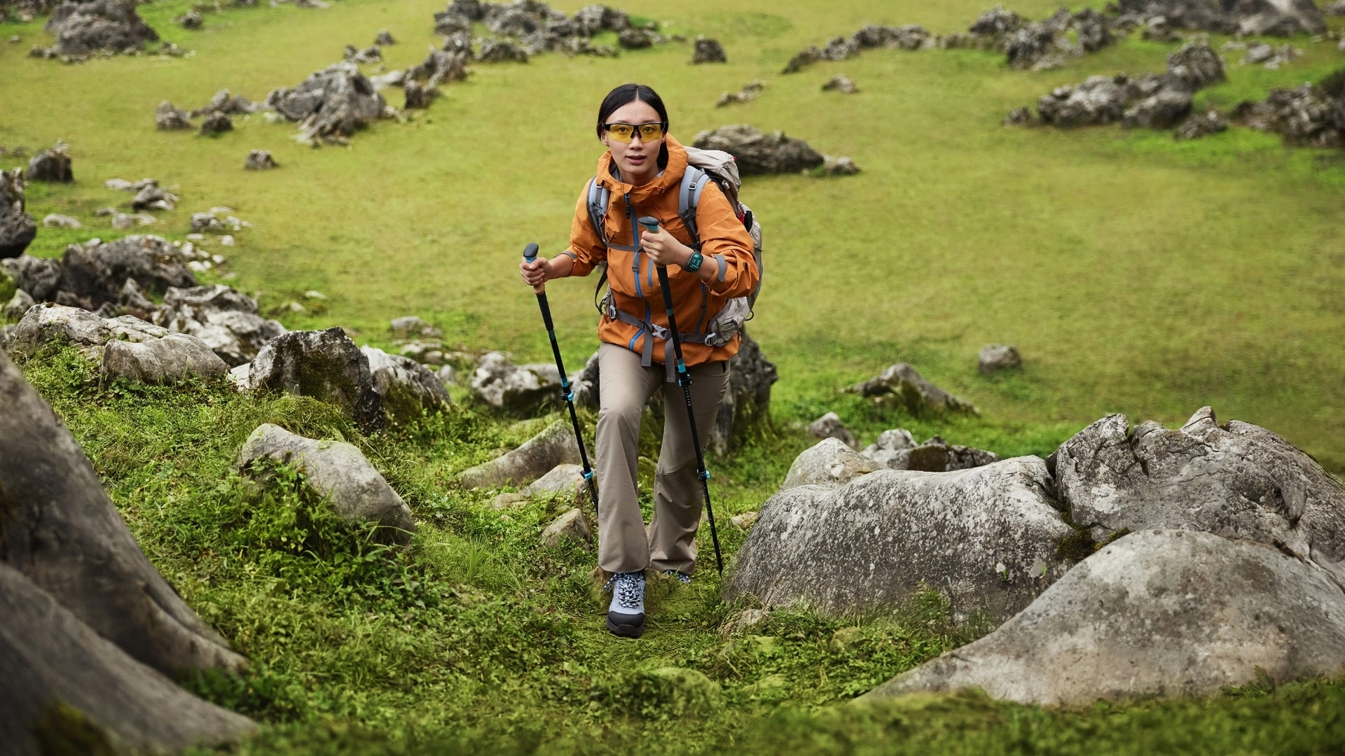 A hiker on a mountain trail